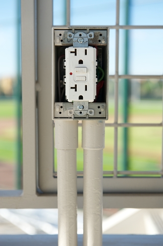 White electrical outlet with GFCI just after it was installed